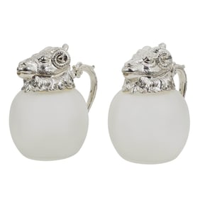 Pair of Silver Plated Ram Head Frosted Glass Pitchers