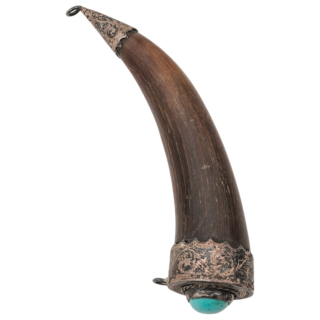 Southwestern Horn, Sterling & Turquoise Pendant: Southwestern Horn, Sterling & Turquoise Pendant 20th c., USA Large horn pendant with ornately engraved sterling silver caps at both ends and a turquoise cabochon at the top. Metal tested sterling