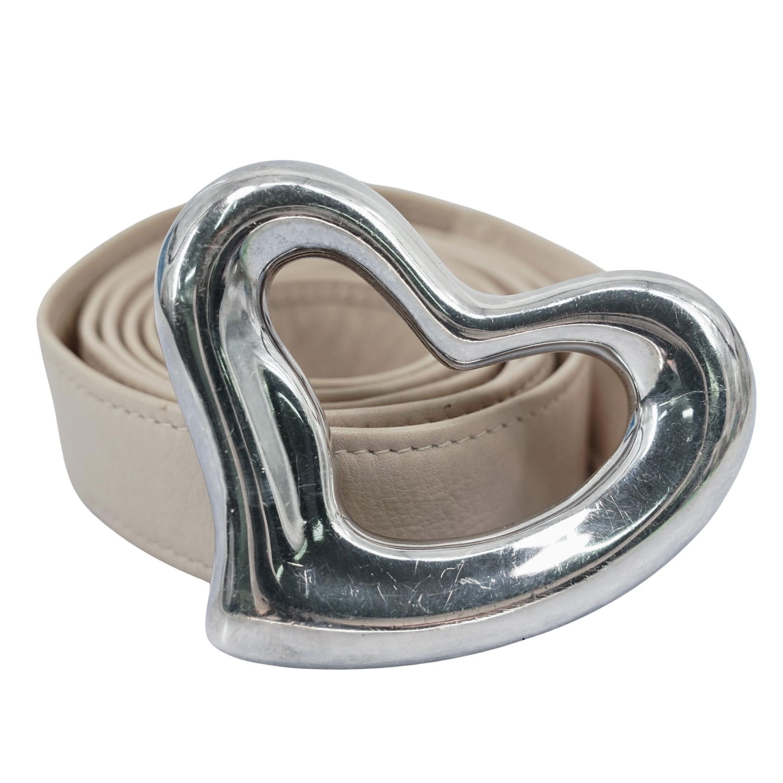 Vintage Tiffany & Co. Elsa Peretti Sterling "Open Heart" Belt: Vintage Tiffany & Co. Elsa Peretti Sterling "Open Heart" Belt 1975, Spain Tan leather wrap belt with a sterling silver fastener and heart buckle by Elsa Peretti for Tiffany & Co. The buckle is