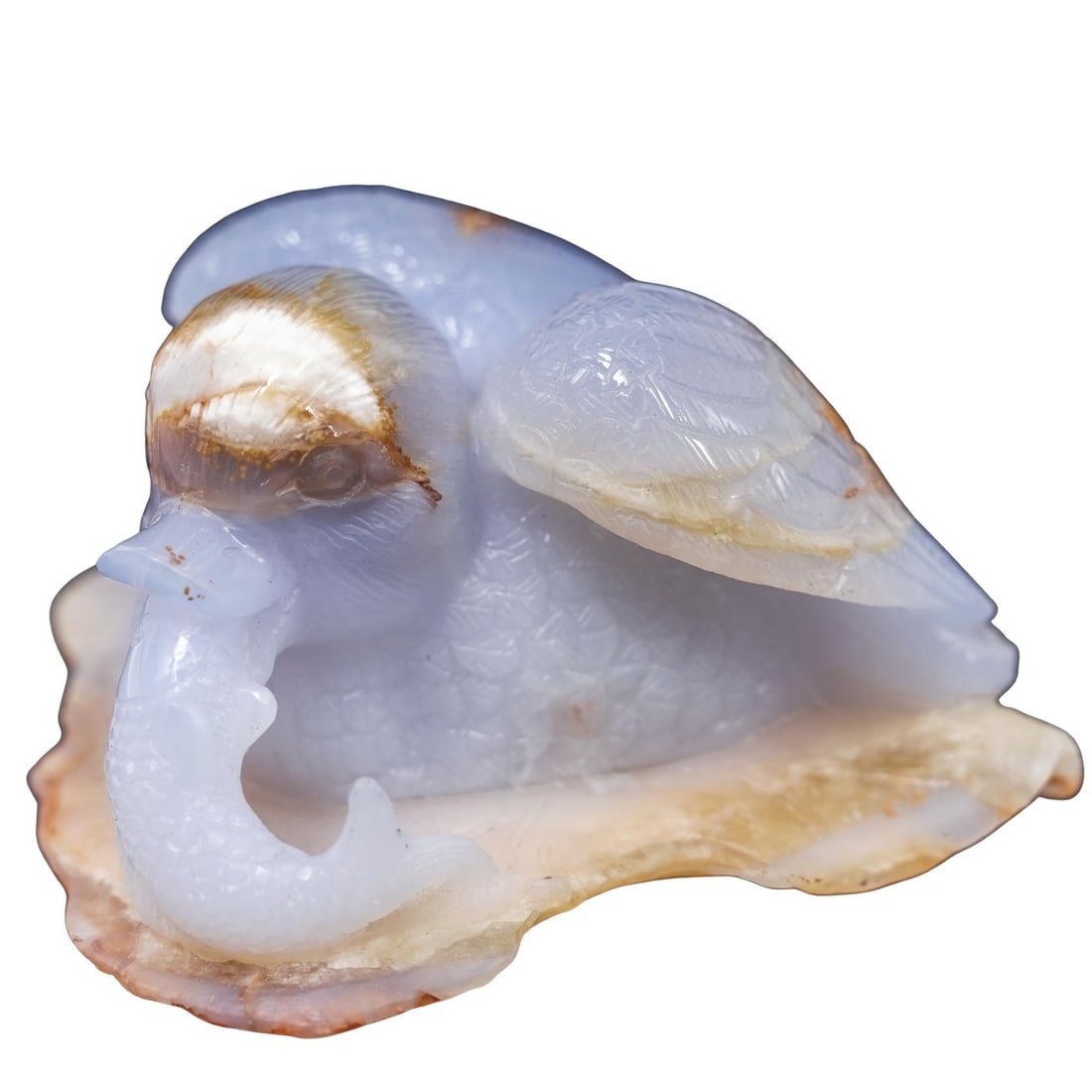 Chinese Carved Blue Chalcedony Duck Figurine: Chinese Carved Blue Chalcedony Duck Figurine 20th c., China Hand-carved blue chalcedony figurine of a duck eating a fish. H: 2" W: 3" L: 3.5"