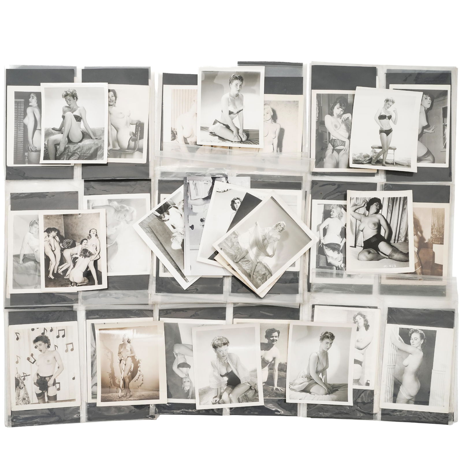 Lot of Vintage 1950s Erotic Photography: Lot of Vintage 1950s Erotic Photography Mid 20th c., USA Large grouping of 1950s-era black and white nude and erotic photographs. Approx. L: 5" W: 4"