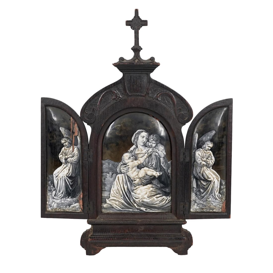 Antique Carved Wood & Enamel Religious Triptych: Antique Carved Wood & Enamel Religious TriptychLate 19th-Early 20th c. EuropeanCarved wood Christian devotional triptych with hinged panels that can be folded shut. The wooden frame features an ornate