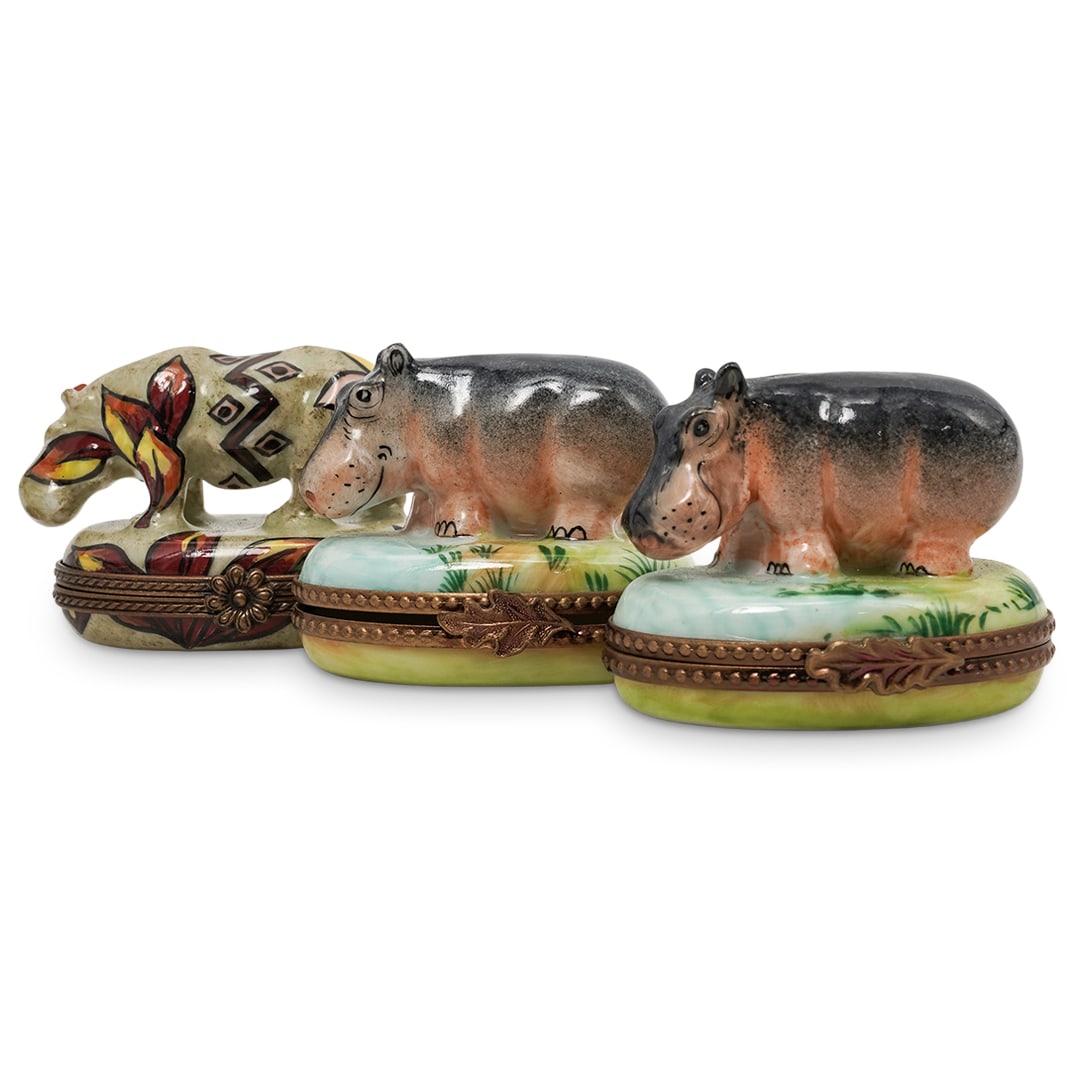 (3 Pc) Limoges Porcelain Hippo Trinket Boxes: (3 Pc) Limoges Porcelain Hippo Trinket Boxes20th c., FranceLimoges hand-painted hippopotamus trinket boxes by Marque Déposée, Rochard, and Chamart Exclusif. Limoges marks on the undersides.Approx. H