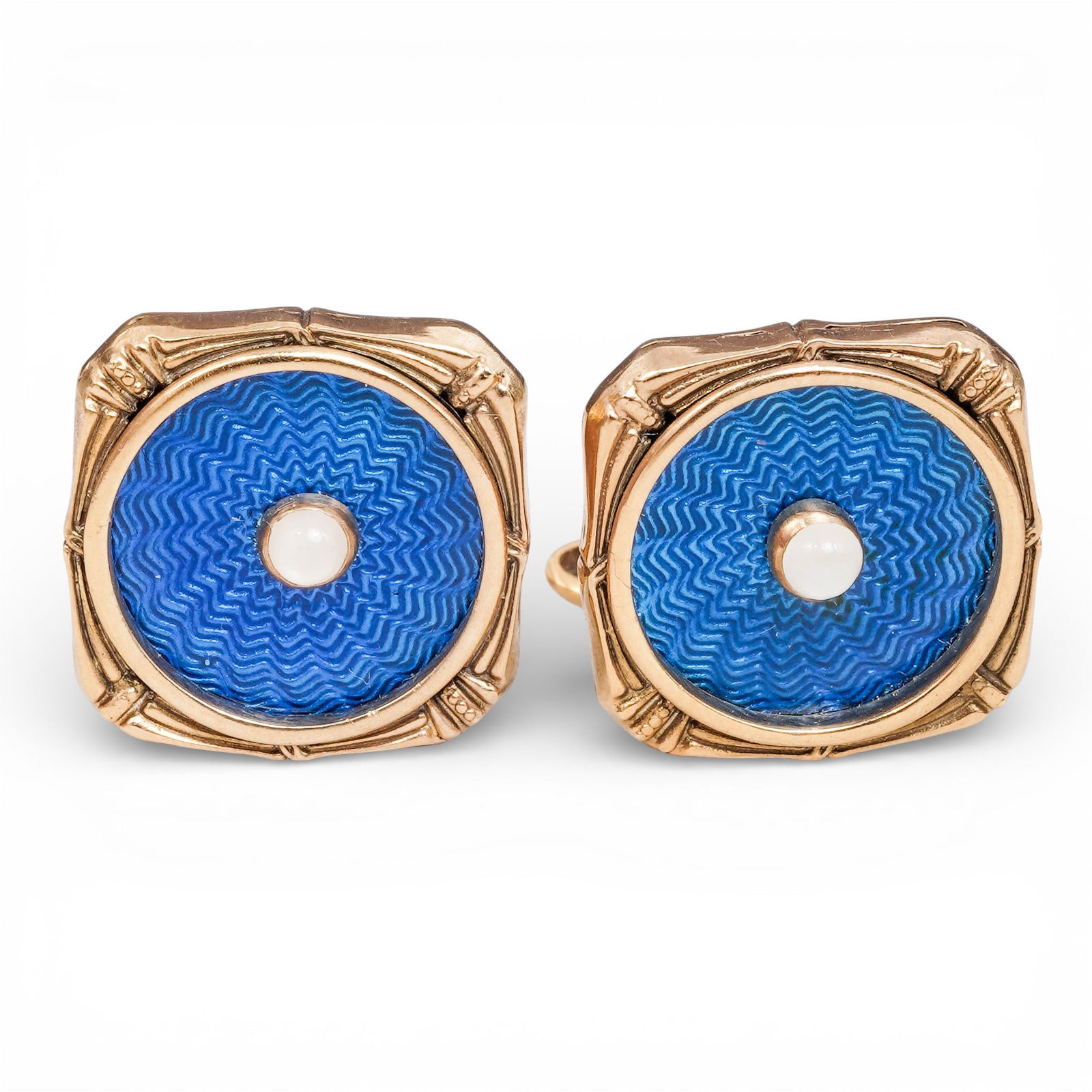 Russian Imperial Silver Gilt Guilloche Enamel & Moonstone Cufflinks: Russian Imperial Silver Gilt Guilloche Enamel & Moonstone CufflinksLate 19th to early 20th century, RussianA pair of Russian Imperial era cufflinks executed in silver with gilt finish, decorated with