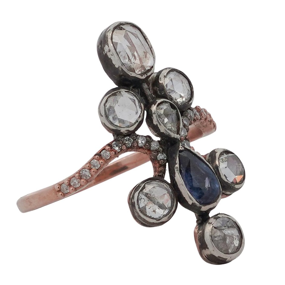 Imperial Era 14k Rose Gold Diamond & Sapphire Ring: Imperial Era 14k Rose Gold Diamond & Sapphire Ring1890-1915, RussiaImperial Era 14k rose gold and silver topped ring, formed in a cluster motif, composed of rose cut diamonds surrounding a central dee