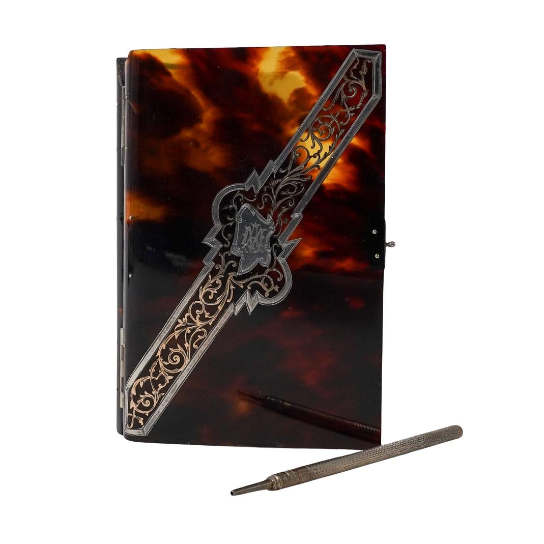 Victorian Tortoise-hued Aide Memoire w/ Pencil and Case: Victorian Tortoise-hued Aide Memoire w/ Pencil and CaseLate 19th century, ContinentalA tortoise-hued antique Victorian aide memoire with retractable pencil (needs lead) and a red case. Aide memoire is