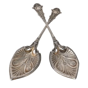 Pair of Frederick Elkington Egyptian Revival Sterling Silver Serving Spoons