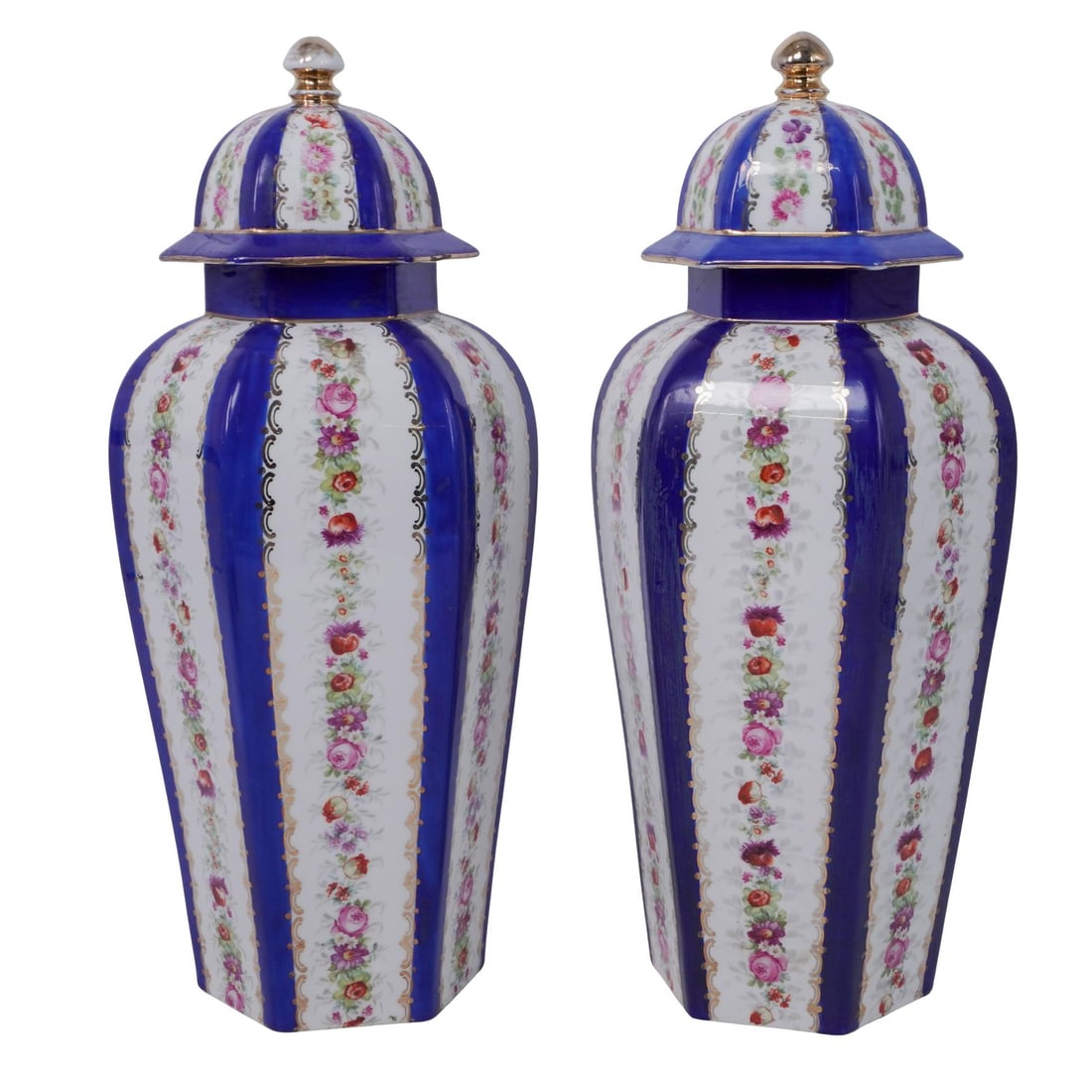 Antique Pair of Victoria Carlsbad Austria Porcelain Urns: Antique Pair of Victoria Carlsbad Austria Porcelain Urns20th century , AustriaAntique Large Pair of Victoria Carlsbad Austria Porcelain urns with cobaltblue and floral pattern with a lid. Marked on th