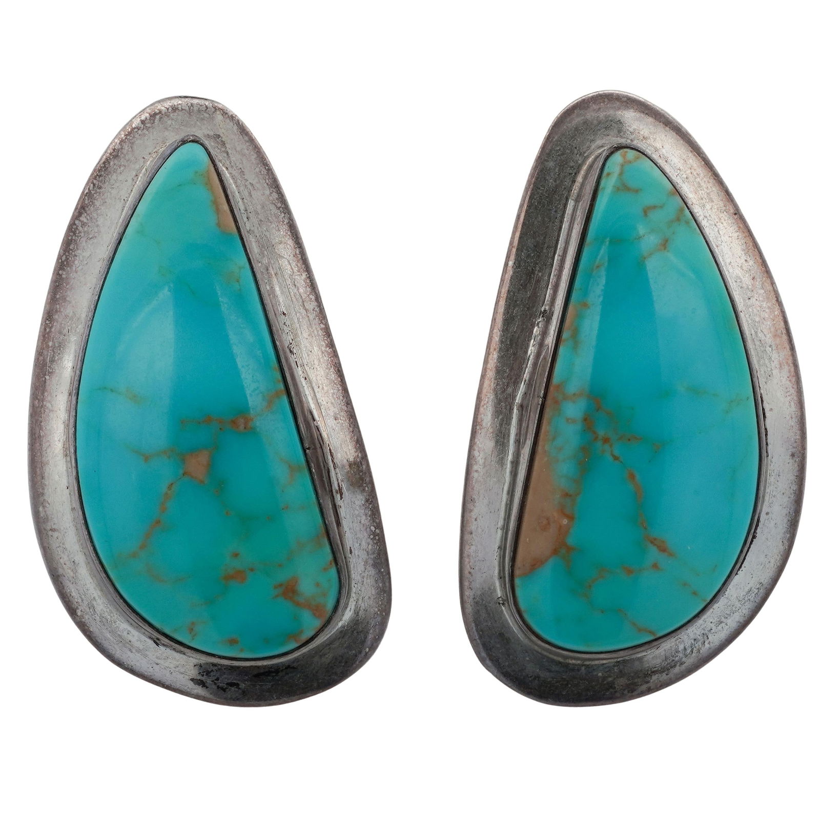 Pair of Modernist Sterling Silver & Turquoise Earrings: Pair of Modernist Sterling Silver & Turquoise Earrings20th cent, USAPair of modernist sterling silver earrings, of teardrop form with turquoise cabochons set in the center. Signed and hallmarked "Ster