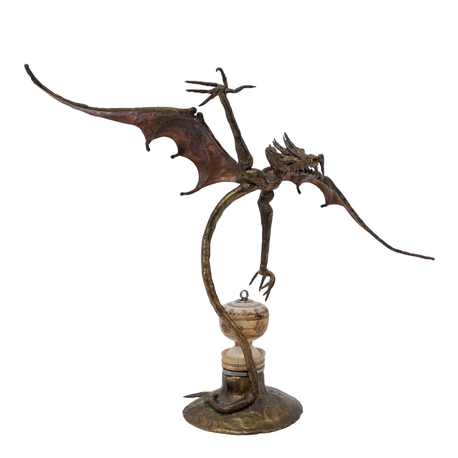 Pamela Chevalier Bronze Dragon & Bone Perfume Bottle: Pamela Chevalier Bronze Dragon & Bone Perfume Bottle1991, USAHand-crafted bronze dragon hovering above a carved bone perfume bottle set inside a round base. The piece is signed "Pamela M. Chevalier" a
