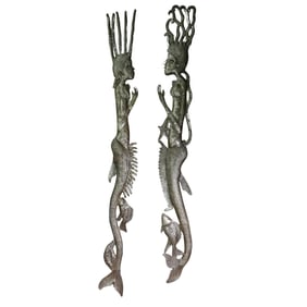Pair of Joseph Peterson (Haitian, 20th cent.) Hand Hammered Metal Mermaids