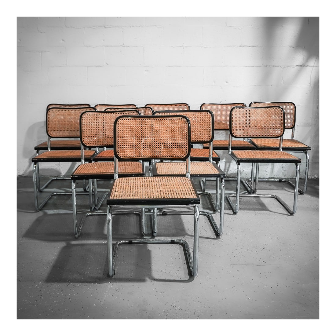 (12 pcs) Marcel Breuer (Hungarian/American, 1902-1981) Beech & Cane "Cesca" Chairs: (12 pcs) Marcel Breuer (Hungarian/American, 1902-1981) Beech & Cane "Cesca" Chairscirca 1970s, ItalyA set of twelve black lacquered beech and cane chairs designed in the "cesca" model by Marcel Breuer