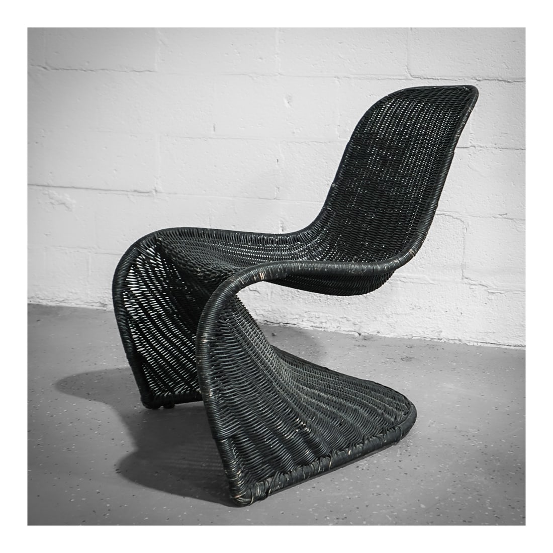 Verner Panton (Danish, 1926-1998) Black Rattan Sculptural Armchair (1 of 7)
