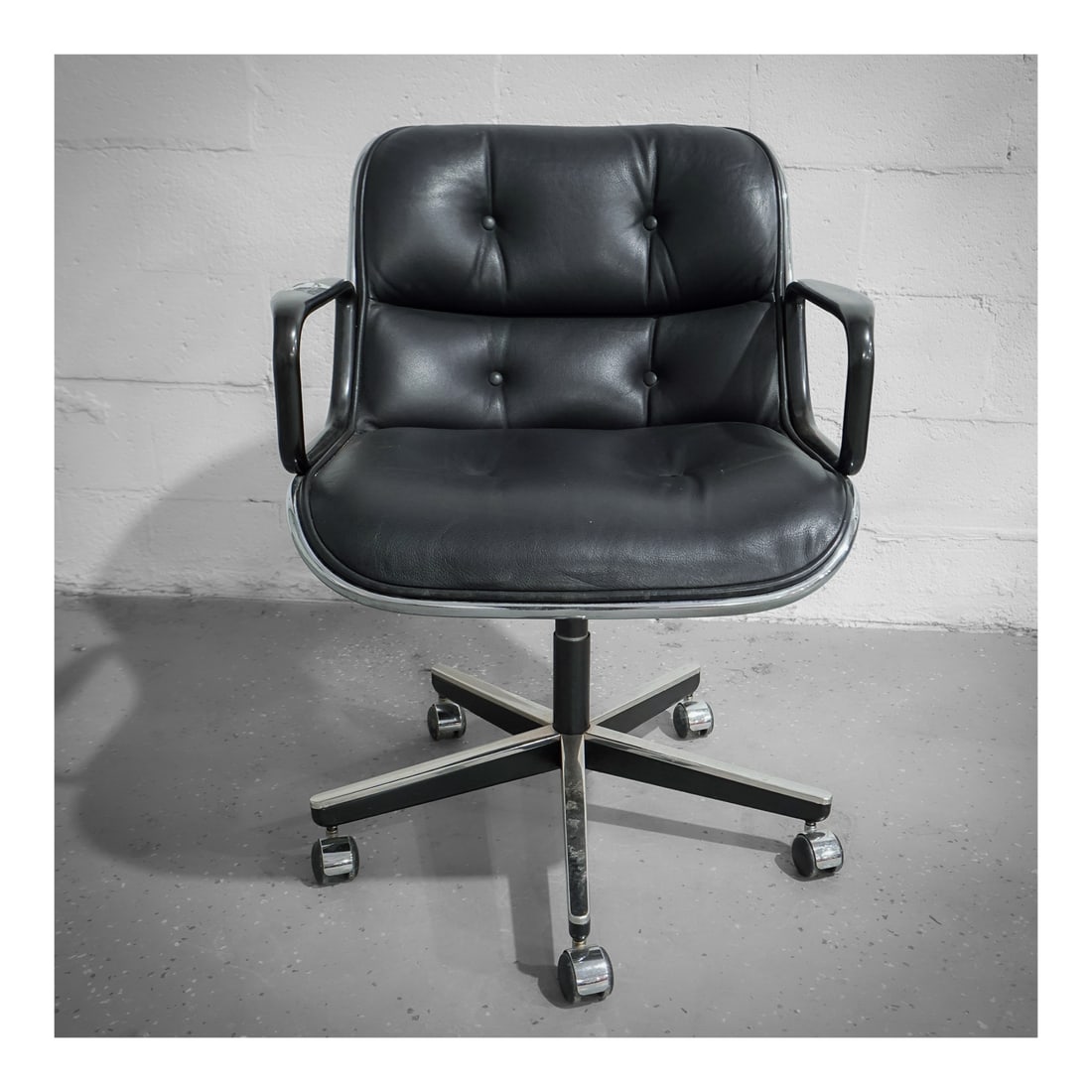 Charles Pollock (American, 1930-2013) for Knoll "Executive" Chair: Charles Pollock (American, 1930-2013) for Knoll "Executive" Chaircirca 1963, USAA black office chair with faux leather (polypropylene) outer shell and utilizing "rim technology" with an aluminum rim a