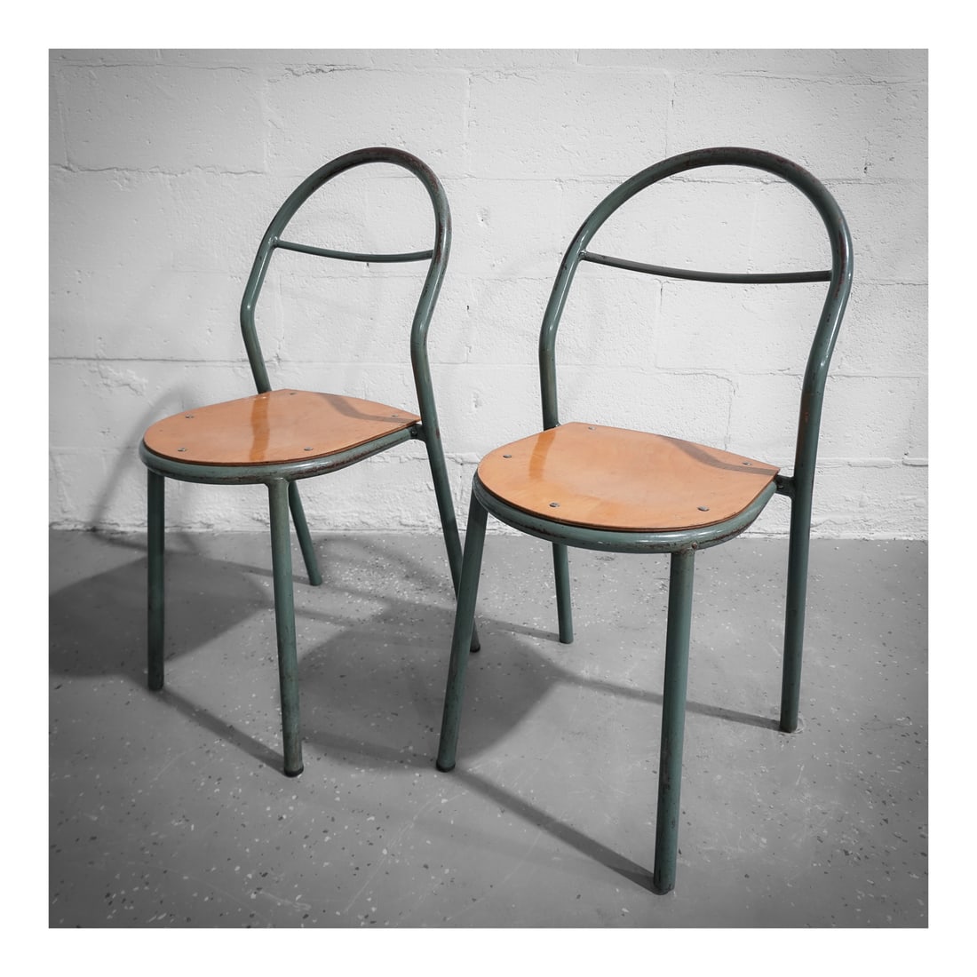 Pair of Rene Herbst (French, 1891-1982) Metal Tube and Wood Bistro Chairs (1 of 6)