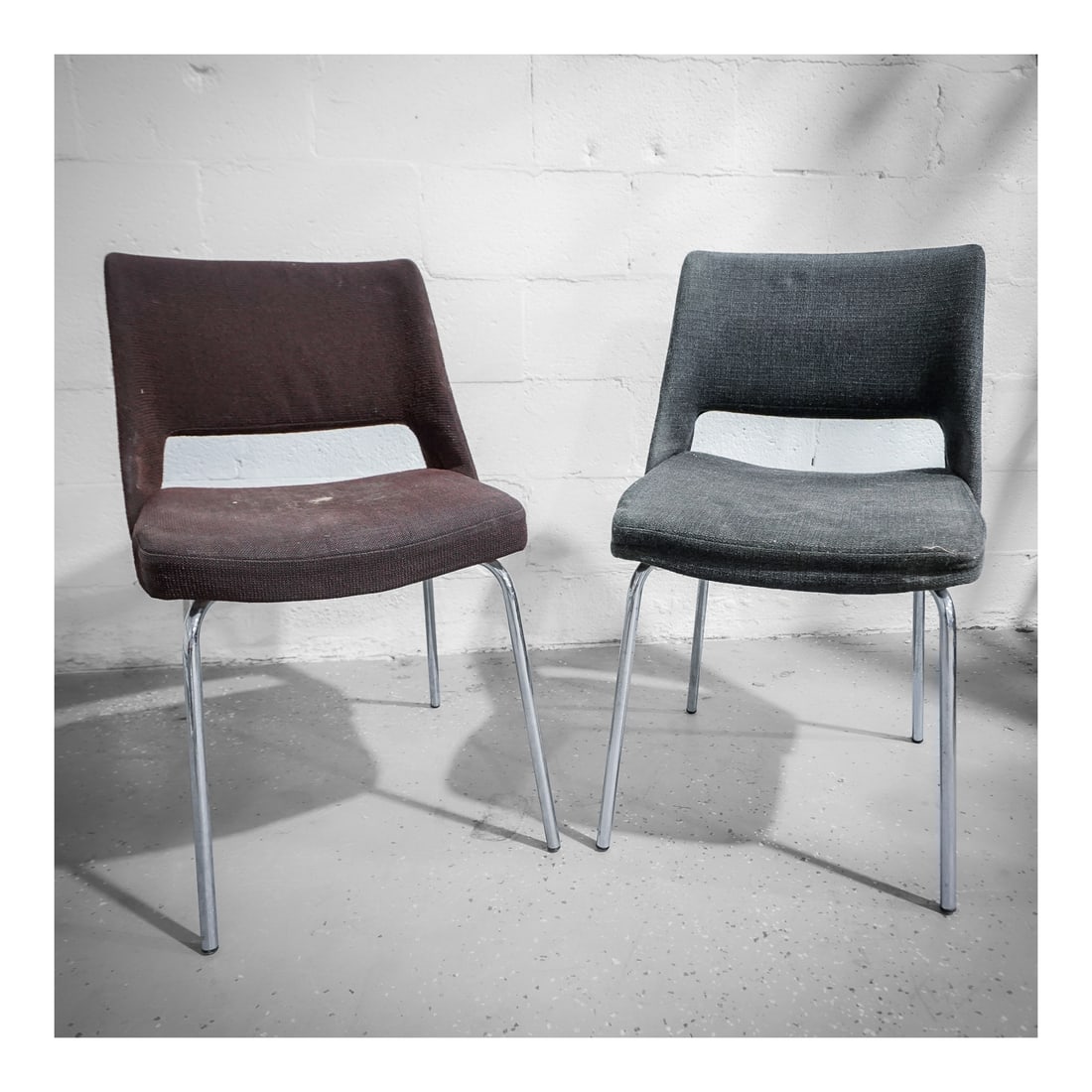 (2 pcs) Postmodern Chrome and Fabric Office Chairs: (2 pcs) Postmodern Chrome and Fabric Office Chairscirca 1970s, EuropeA set of two postmodern designed office chairs in dark fabric upholstered seats and chromw legs/framework. Marked on bottom "CRBCAM