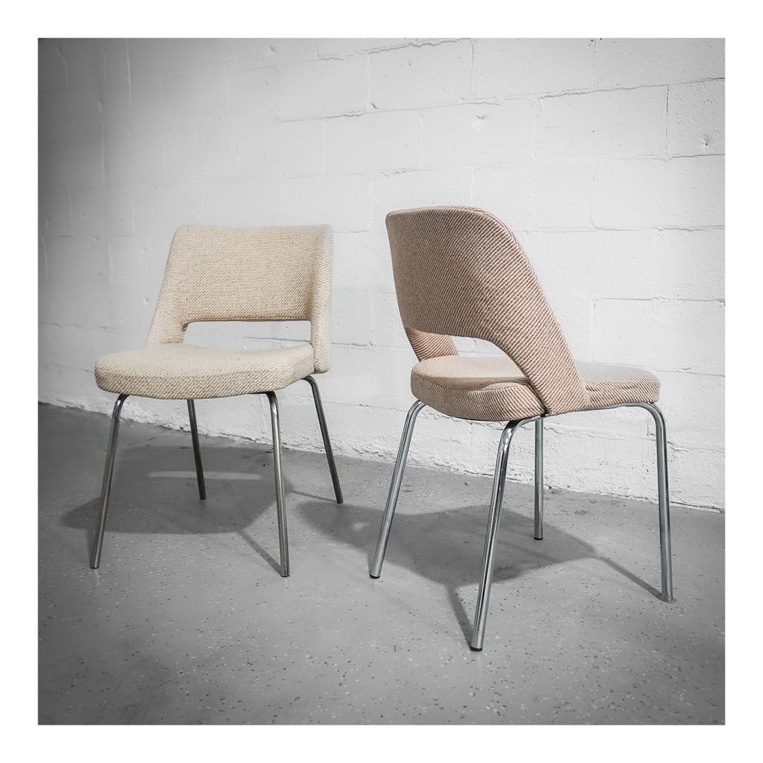 Pair of Scandinavian Modern Upholstered Side Chairs: Pair of Scandinavian Modern Upholstered Side Chairscirca 1960s, ScandinavianA pair of Scandinavian modern side chairs with beige fabric upholstery and metal legs.H 32" Depth 22" W 19"
