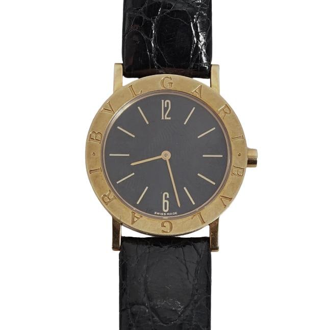 BVLGARI BB 33 GL 18k Gold Watch w/ Black Leather Di Modell Band: BVLGARI BB 33 GL 18k Gold Watch w/ Black Leather Di Modell Band20th century, French, Swiss madeA BVLGARI 18k gold watch with a black leather Di Modell band. Watch face engraved "BVLGARI" and clock fac