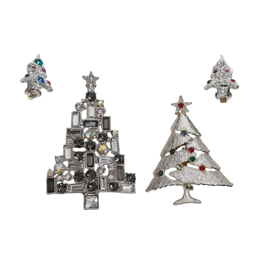 (4 pcs) Vintage Silver Christmas Tree Jewelry; Brooches, Dodd's Earrings: (4 pcs) Vintage Silver Christmas Tree Jewelry; Brooches, Dodd's Earrings20th centuryA grouping of Christmas tree jewelry including two pins and a set of earrings.x2 Snap on silver plated Christmas tre