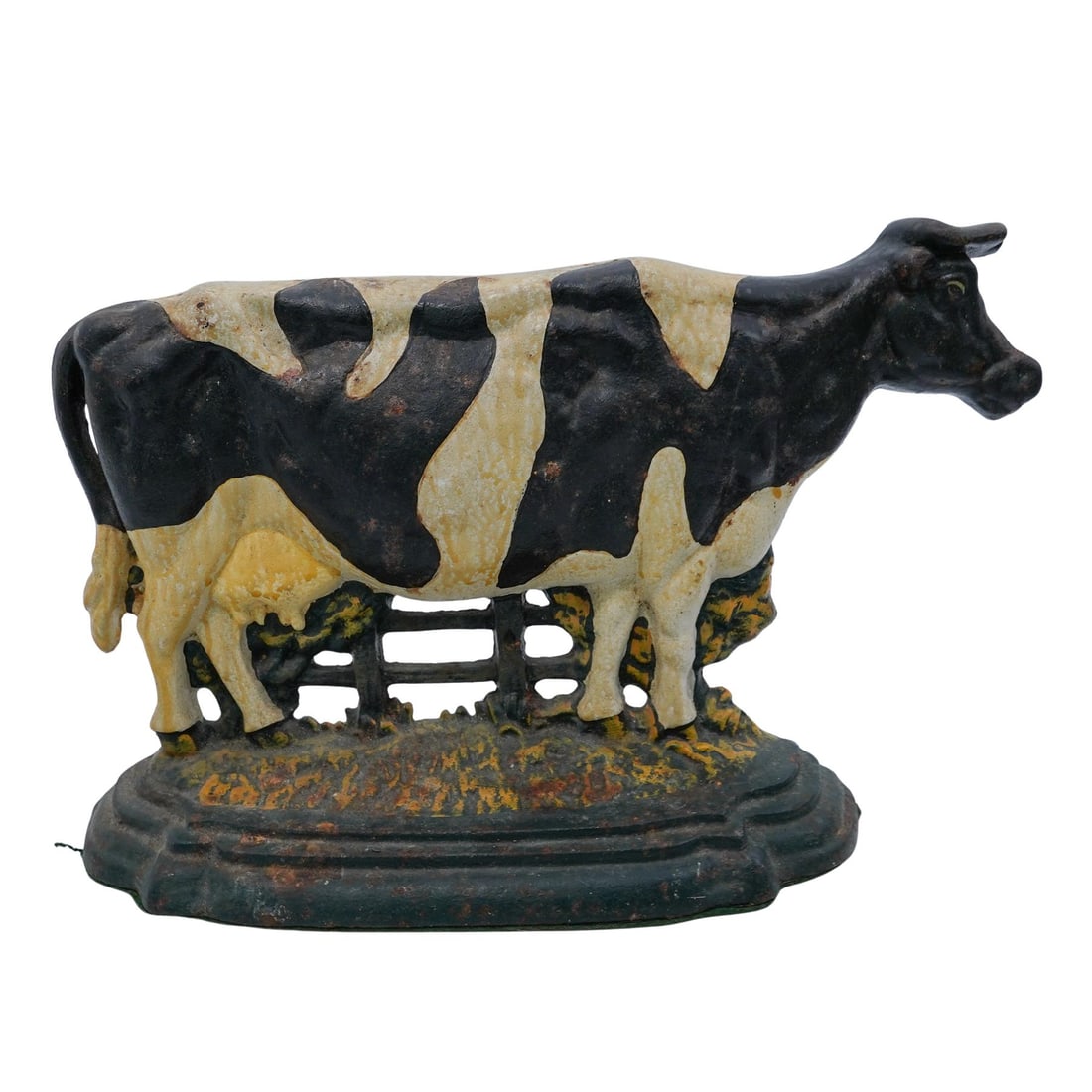 Vintage Cast Iron Cow Door Stopper: Vintage Cast Iron Cow Door Stopper20th c., ContinentalPolychrome cold painted cast iron cow profile door stopper.Approx. H: 8.5" W: 3.25" L: 15"