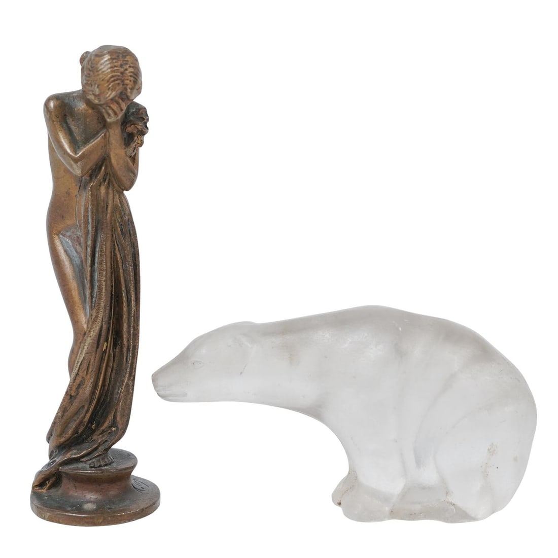 (2 Pc) Vintage Desk Accessories: (2 Pc) Vintage Desk Accessories20th c., ContinentalArt nouveau monogrammed bronze wax seal featuring a nude woman holding a sheet and covering her face with her hand.Small frosted glass polar bear pap