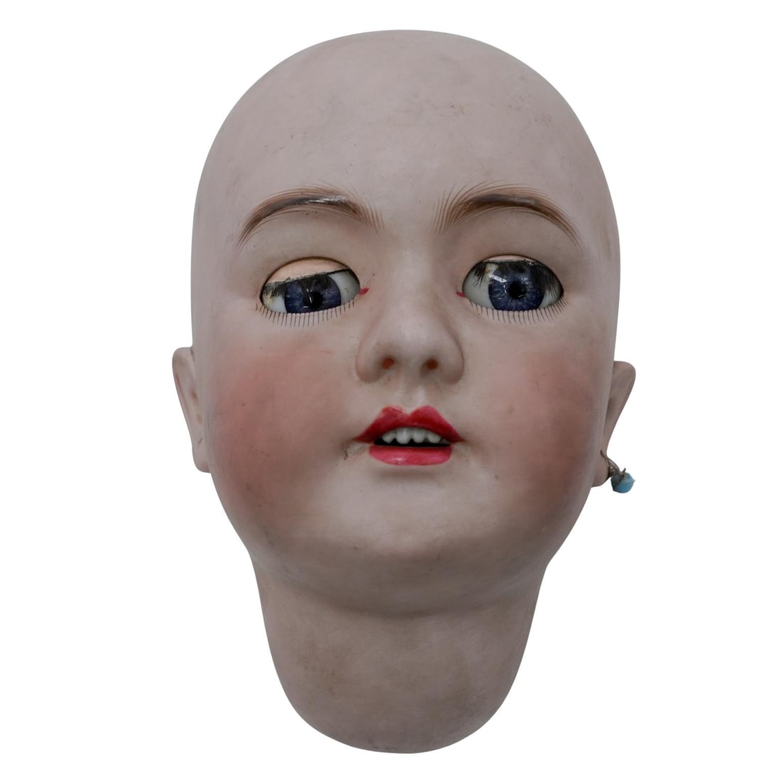 Antique French Tete Jumeau Porcelain Doll Head: Antique French Tete Jumeau Porcelain Doll Head19th-20th c., FranceLarge bisque porcelain doll head with deep blue glass eyes, finely painted brows and lashes, open mouth with four porcelain teeth, pie