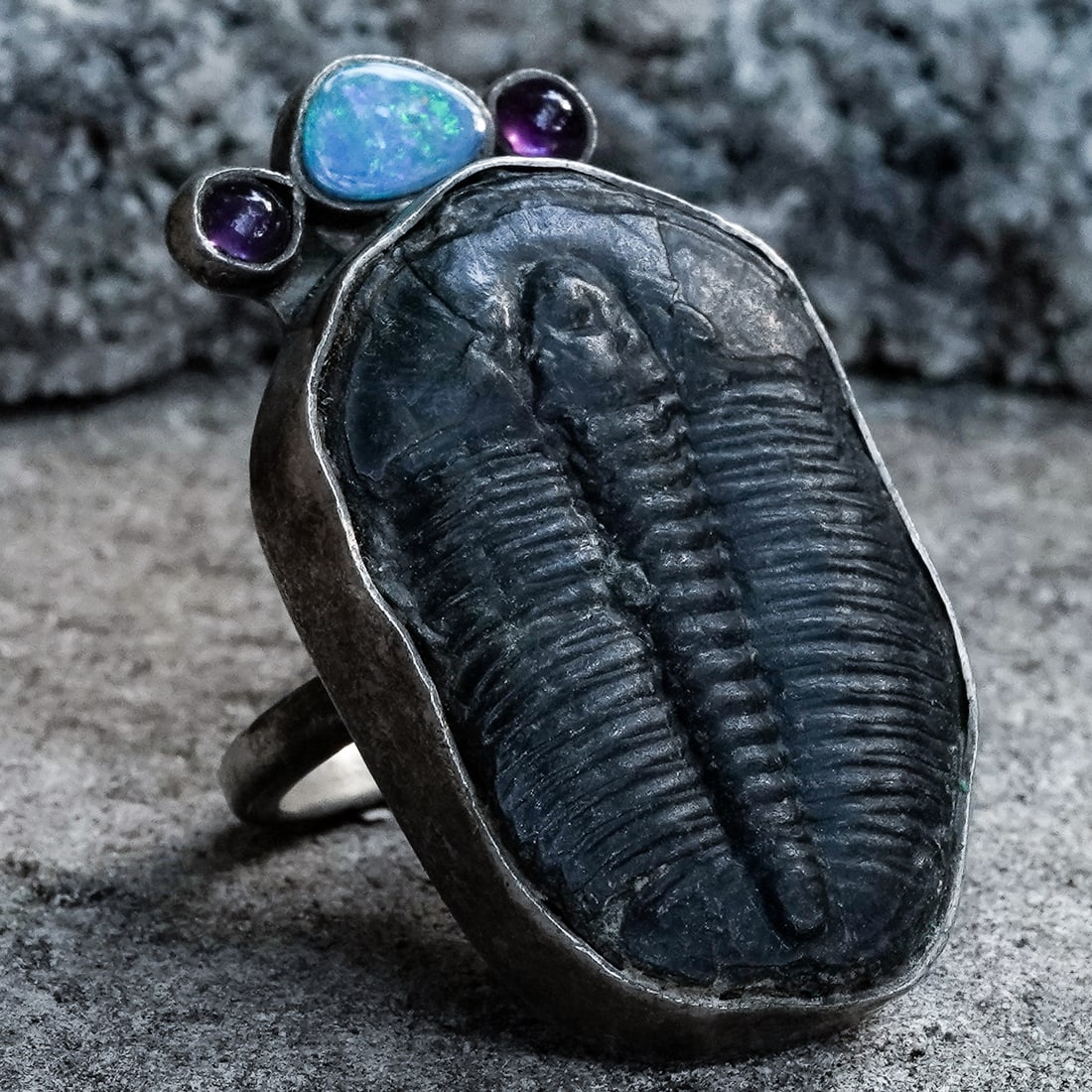 Margaret Thurman "The Dreamer" Sterling Silver, Opal, Amethyst & Trilobite Fossil Ring: Margaret Thurman "The Dreamer" Sterling Silver, Opal, Amethyst & Trilobite Fossil RingCirca 1990s–2000s, USA.Contemporary studio sterling silver ring stamped “STERLING" and "THE DREAMER”, at