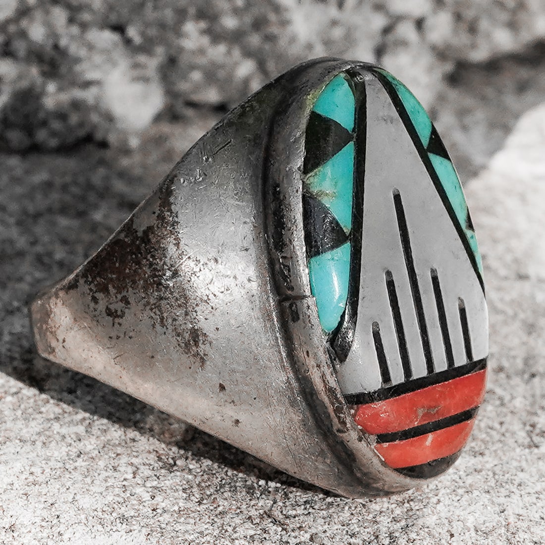 Robert Johnson Vintage Navajo Sterling Silver & Multi-stone Inlay Ring: Robert Johnson Vintage Navajo Sterling Silver & Multi-stone Inlay RingCirca 1980s–1990s, USA.Vintage Navajo sterling silver ring features a bold geometric multi-stone inlay panel measuring approxima