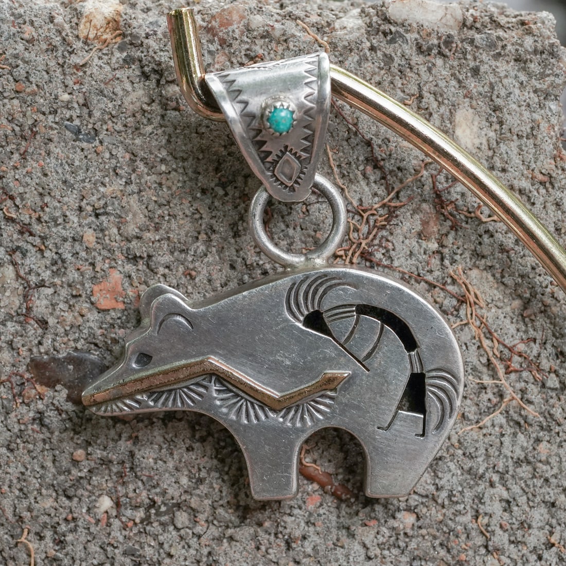 G. Perry Vintage Navajo Sterling Silver & Turquoise Bear Pendant: G. Perry Vintage Navajo Sterling Silver & Turquoise Bear Pendant Late 20th Cent, USA Vintage Navajo sterling silver bear-shaped pendant featuring traditional engraved and cutout motifs across the body