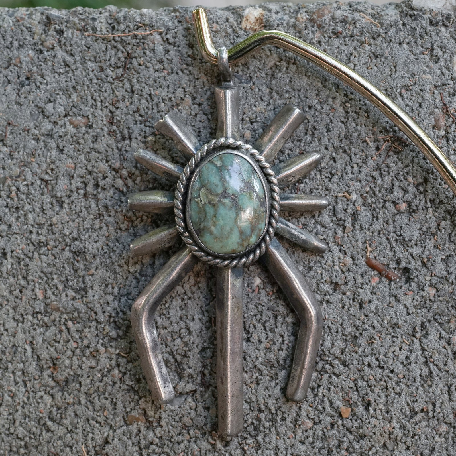 Lina Shepherd Navajo Sterling Silver Spider Pendant with Green Turquoise: Lina Shepherd Navajo Sterling Silver Spider Pendant with Green Turquoise circa 1980s–1990s, USA. A handmade Navajo sterling silver spider pendant by artist Lina Shepherd, featuring a central green t
