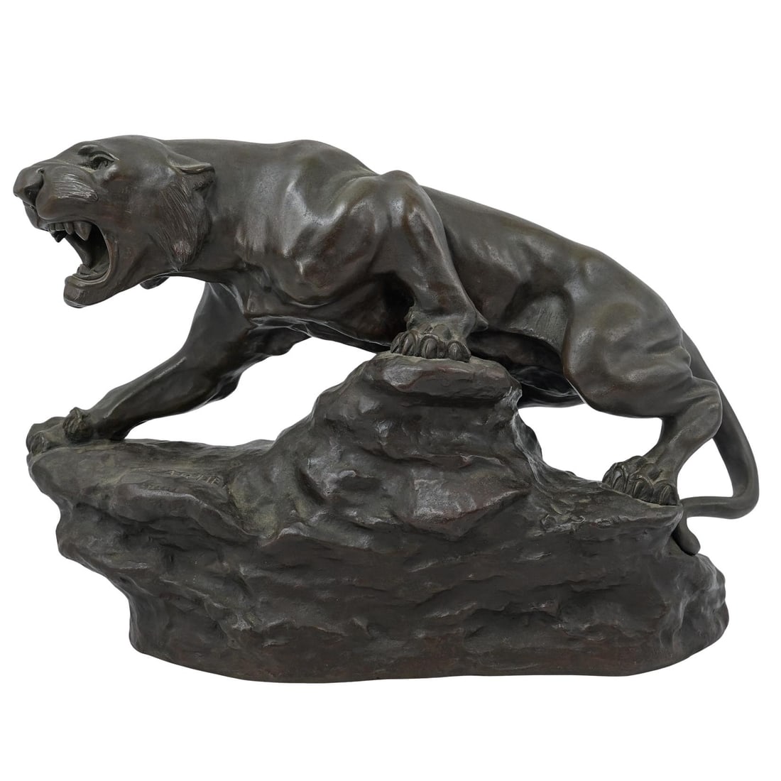 Thomas Cartier (1879-1943) Patinated Bronze Panther Sculpture: Thomas Cartier (1879-1943) Patinated Bronze Panther SculptureMid 20th Cent. FranceThe composition depicts a roaring panther poised atop a rocky outcrop, cast in bronze with rich dark brown patina and