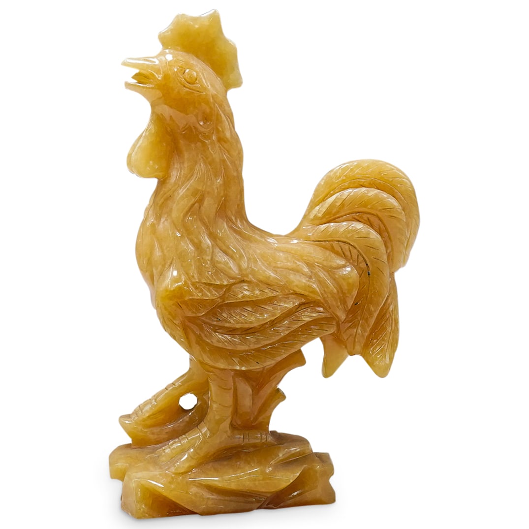 Vintage Chinese Butterscotch Resin Rooster: Vintage Chinese Butterscotch Resin Rooster20th Cent., ChinaVintage yellow resin rooster raising his neck to crow while standing among foliage on rocky terrain.H: 10" W: 2.75" L: 6.5"