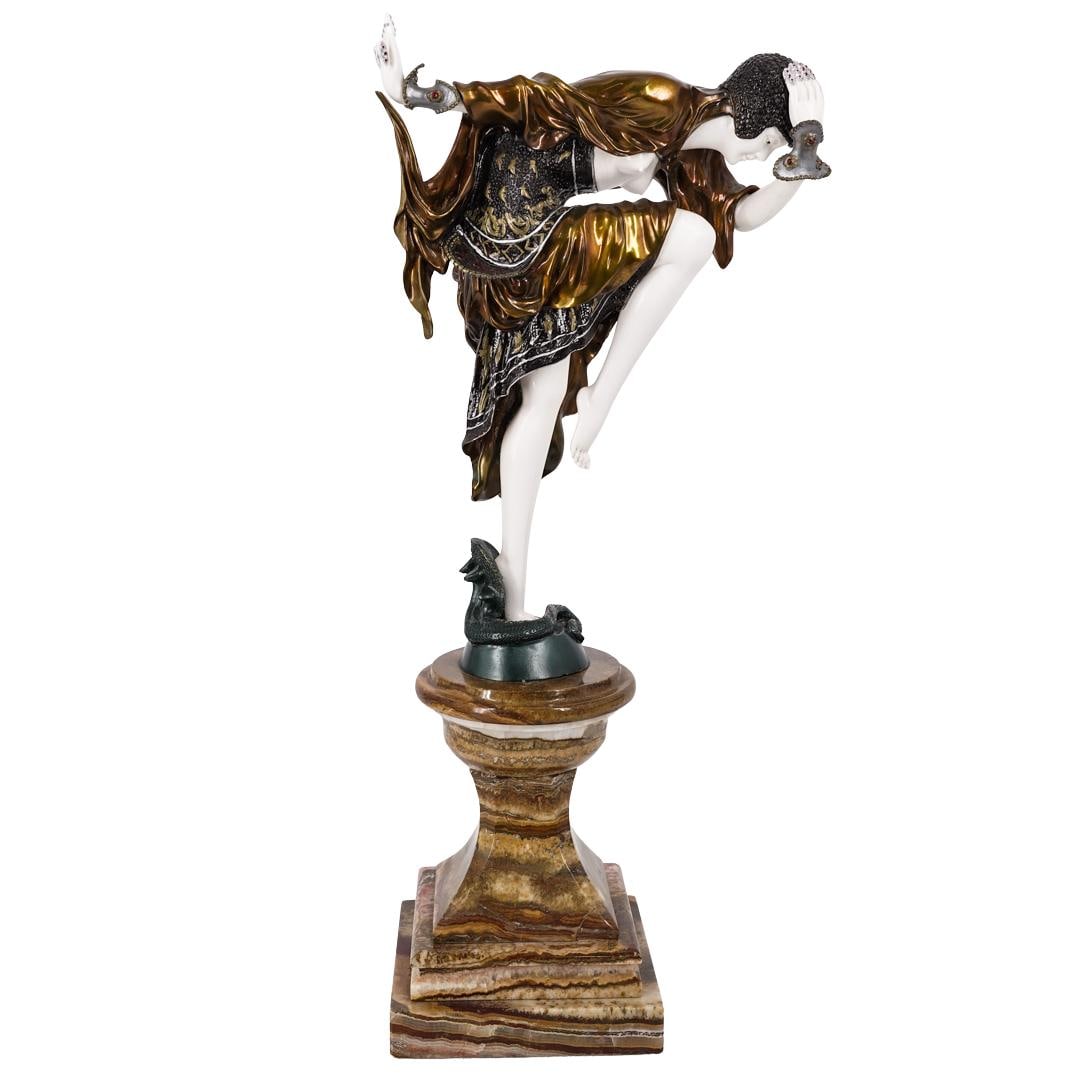 Claire Jeanne Roberte Colinet (French 1880-1950) Bronze Snake Dancer: Claire Jeanne Roberte Colinet (French 1880-1950) Bronze Snake Dancer1925, FrenchLarge Bronze & carved bone snake dancer sculpture depicts an exotic female dancer in a dynamic pose, poised on the toes