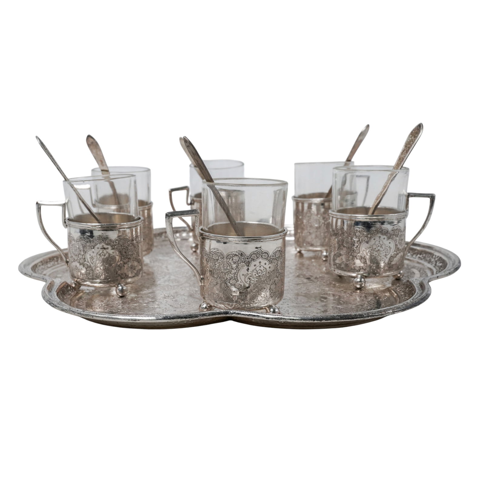 (7 pcs) Vintage Sterling Persian Silver Tea Set: (7 pcs) Vintage Sterling Persian Silver Tea SetEarly to mid 20th century, PersianA vintage Persian sterling silver tea set. Features a floral cut rim tray with ornate floral designs and figural motifs