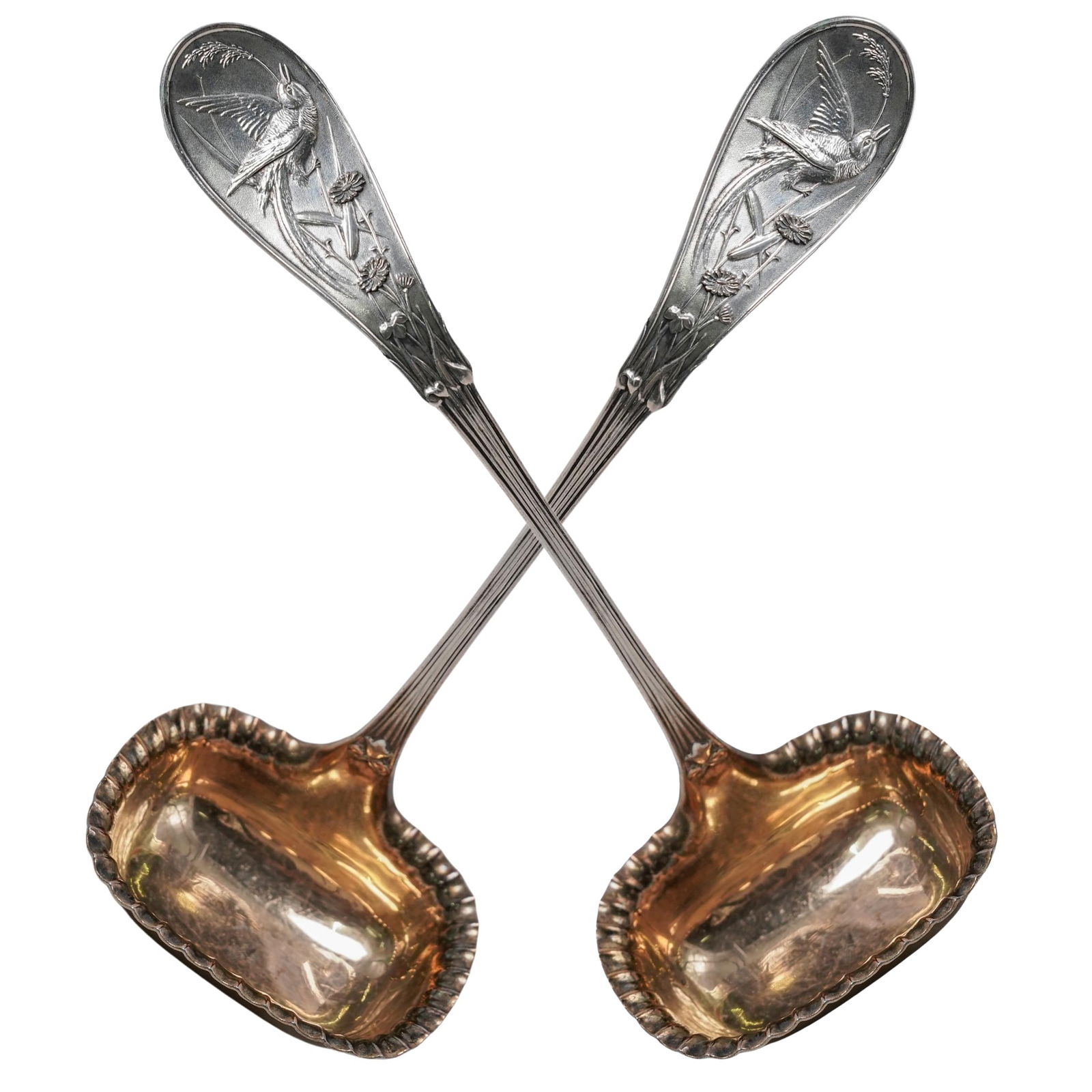Antique Tiffany & Co. "Japanese" Sterling Silver Gravy Ladles: Antique Tiffany & Co. "Japanese" Sterling Silver Gravy LadlesLate 19th-early 20th century, AmericanA pair of Tiffany & Co. sterling silver flat gravy ladles in the pattern "Japanese" (discontinued, ma