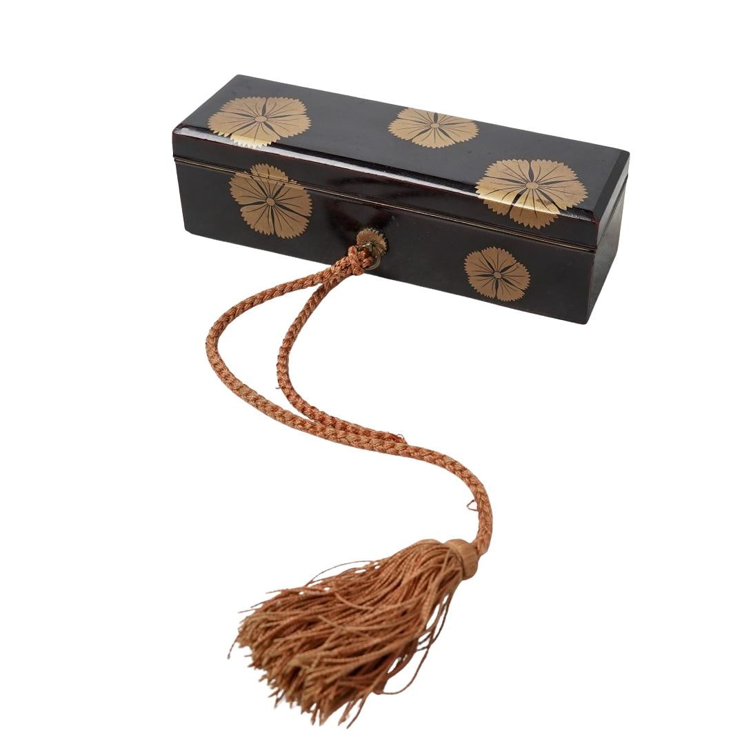 Japanese Meiji Era Suzuribako Lacquer Writing Box: Japanese Meiji Era Suzuribako Lacquer Writing BoxLate 19th-Early 20th c., JapanAntique Japanese suzuribako lacquer writing box featuring floral maki-e gold decoration. Inside, it contains a calligraph