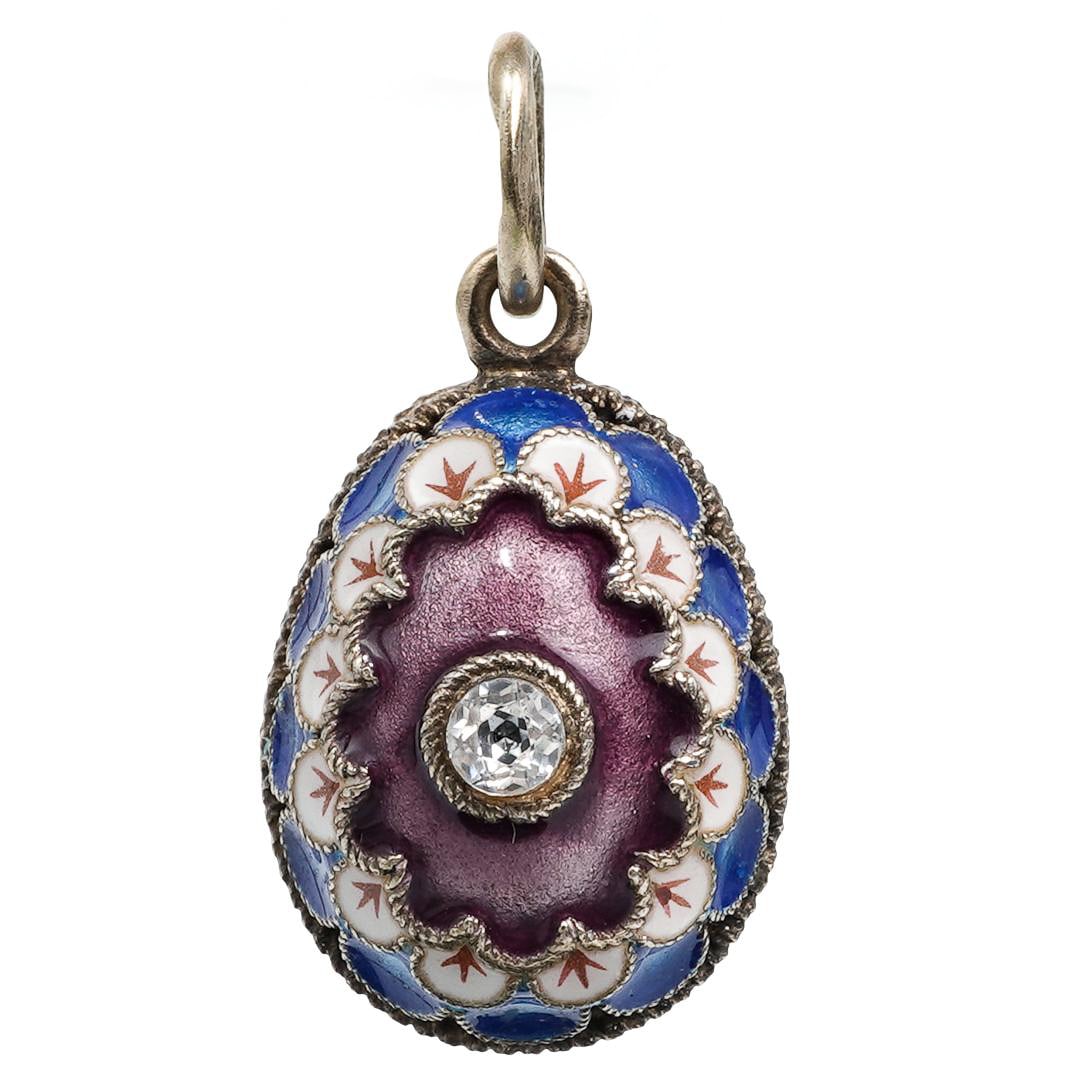Russian Sterling Silver Enameled Egg Pendant: Russian Sterling Silver Enameled Egg Pendant20th century, RussiaA sterling silver hallmarked Russian enameled egg pendant with clear stone inset. Marked on ring "925" "8" with an anchor mark. Total we