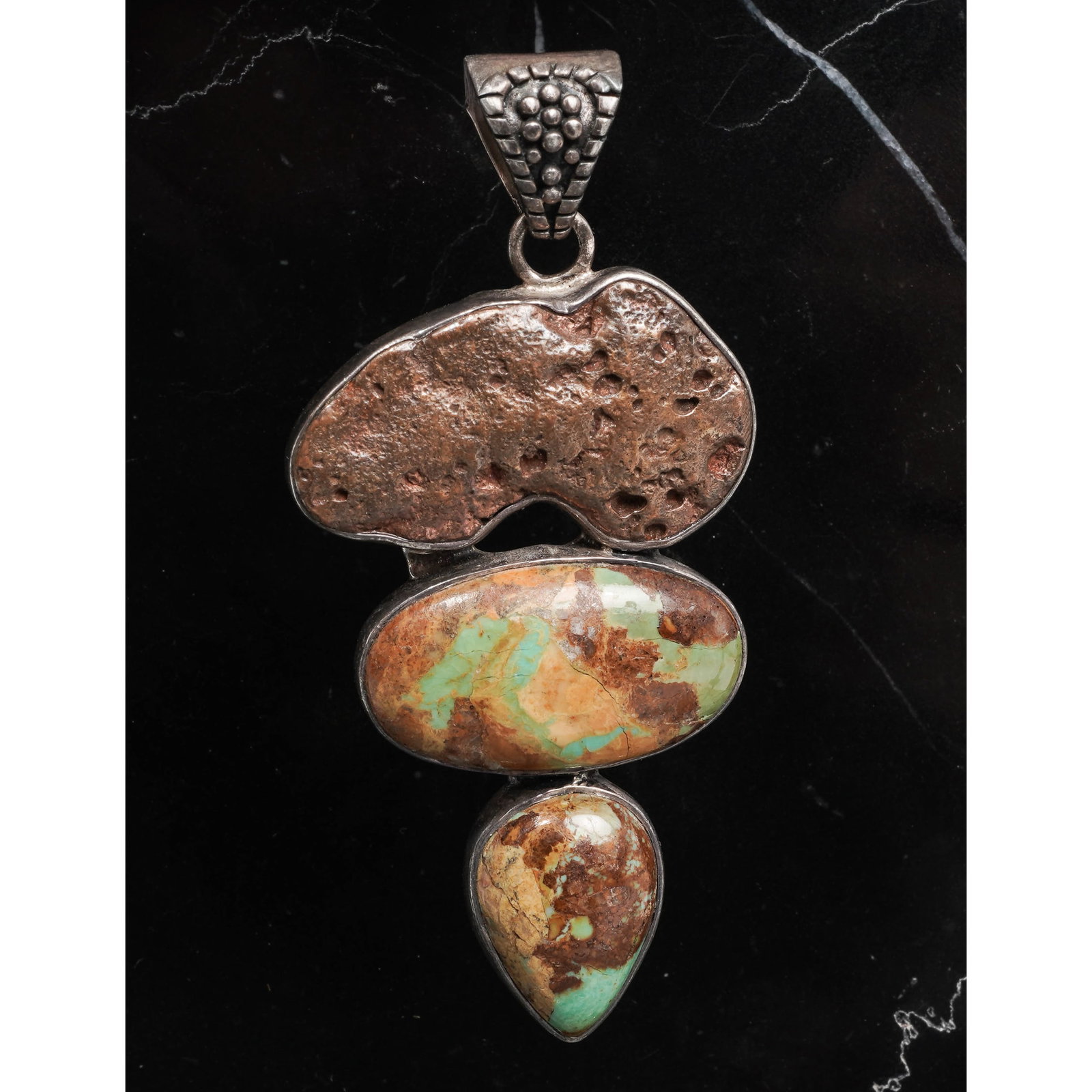 ARYA Sterling Silver Turquoise & Copper Nugget Pendant: ARYA Sterling Silver Turquoise & Copper Nugget PendantCirca 1990s-2000s, USASterling silver pendant by ARYA, featuring a naturally contoured copper nugget measuring approximately 32 × 26 mm, complime