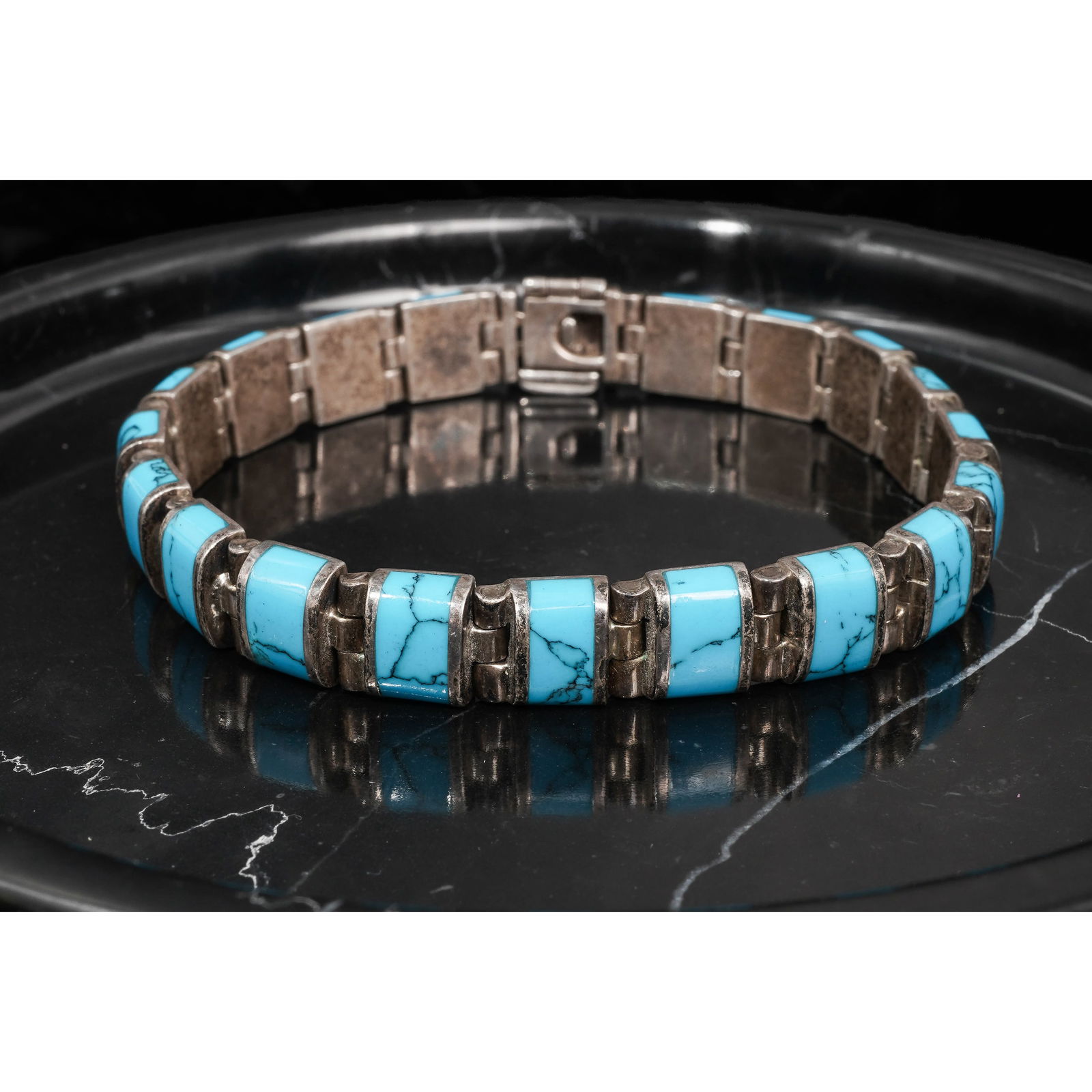 Vintage Mexican Sterling Silver & Turquoise Bracelet: Vintage Mexican Sterling Silver & Turquoise BraceletCirca 1960s-1970s, MexicanVintage Mexican silver link bracelet constructed of rectangular turquoise segments measuring approximately 10 × 6 mm, fra