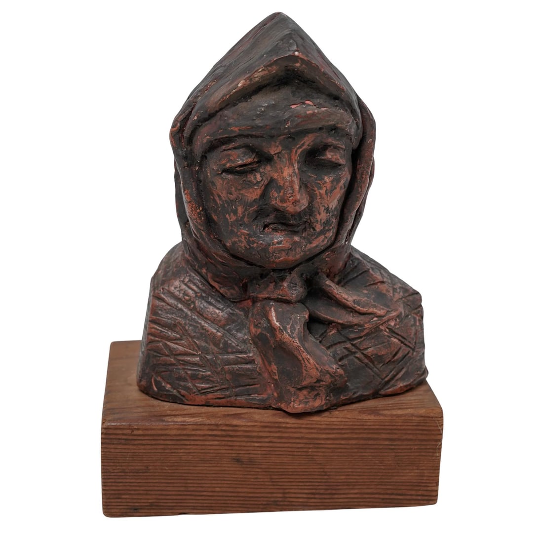 Antique Terracotta Bust: Antique Terracotta Bust20th century, EuropeanTerra-cotta bust of an elderly woman wearing a headscarf, mounted on wooden base, associated with European folk art. Signed on the back M. ThostinH. 8" x L