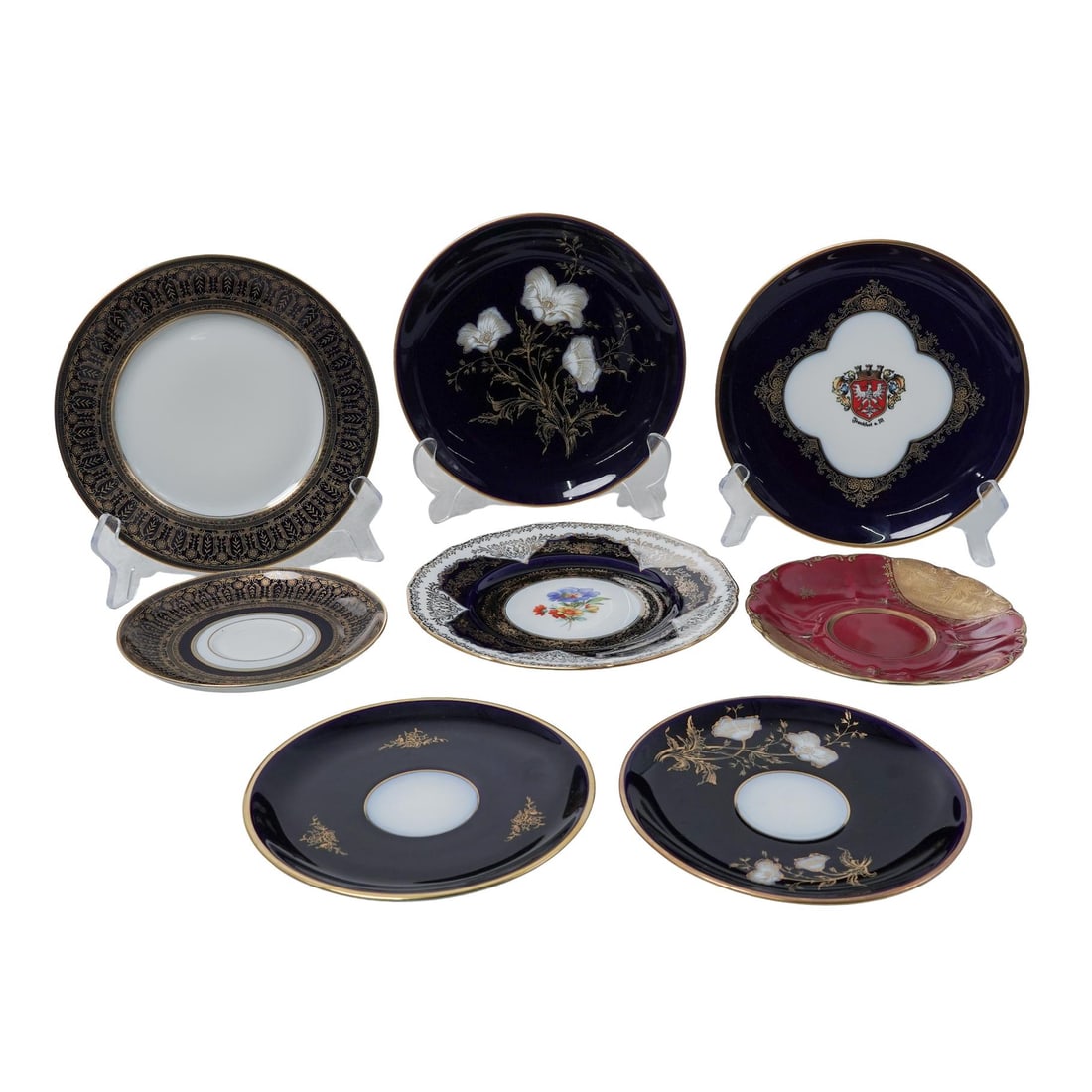 (8pc) Assorted Gilded Porcelain Plate Group: (8pc) Assorted Gilded Porcelain Plate Group19th Cent.,German, CzechAssorted group of eight gilded porcelain plates including,(1) Scalloped plate with a cobalt blue and gilt border and a centered habd