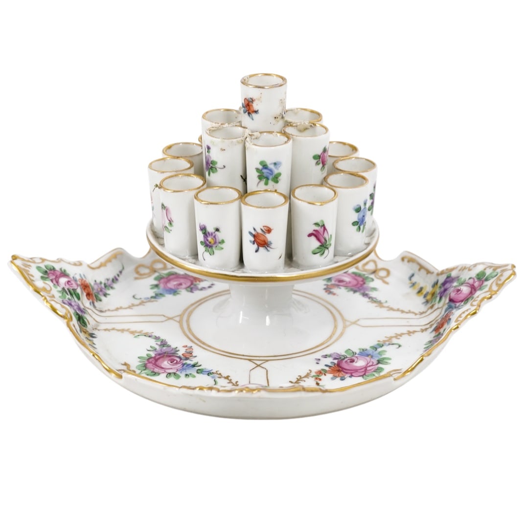 Dresden Porcelain Cigarette Holder: Dresden Porcelain Cigarette HolderEarly 20th Cent. CzechThis Bohemian cigarette holder is crafted from fine Bohemian porcelain produced by the T.K Thun factory. It is decorated in the popular "Dresden