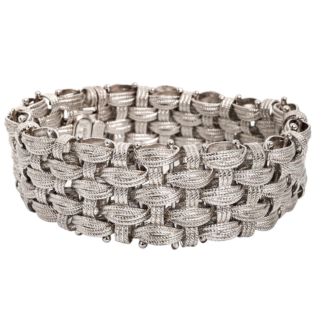 Vintage Dasan Italian Sterling Silver Woven Link Bracelet: Vintage Dasan Italian Sterling Silver Woven Link BraceletCirca Late 20th Century, ItalyVintage sterling silver woven link bracelet by Dasan Inc., of wide articulated construction composed of interlock