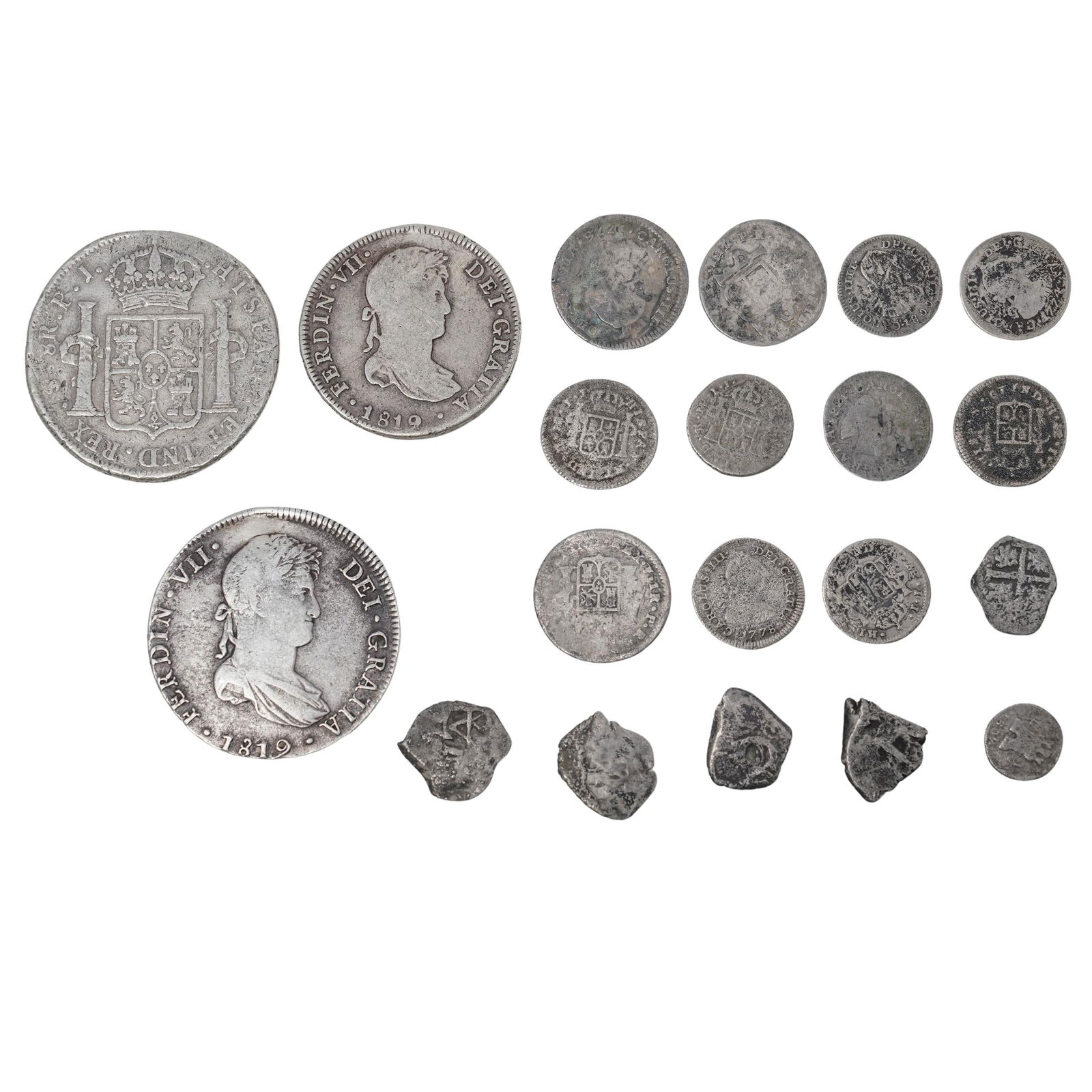 (20 pcs) Antique Spanish Colonial Silver Coins: (20 pcs) Antique Spanish Colonial Silver CoinsEarly 17th to early 19th century, SpanishA set of twenty Spanish colonial silver coins.(11) King Charles III & IIII silver coins, dated 1774-1800(5) Spani