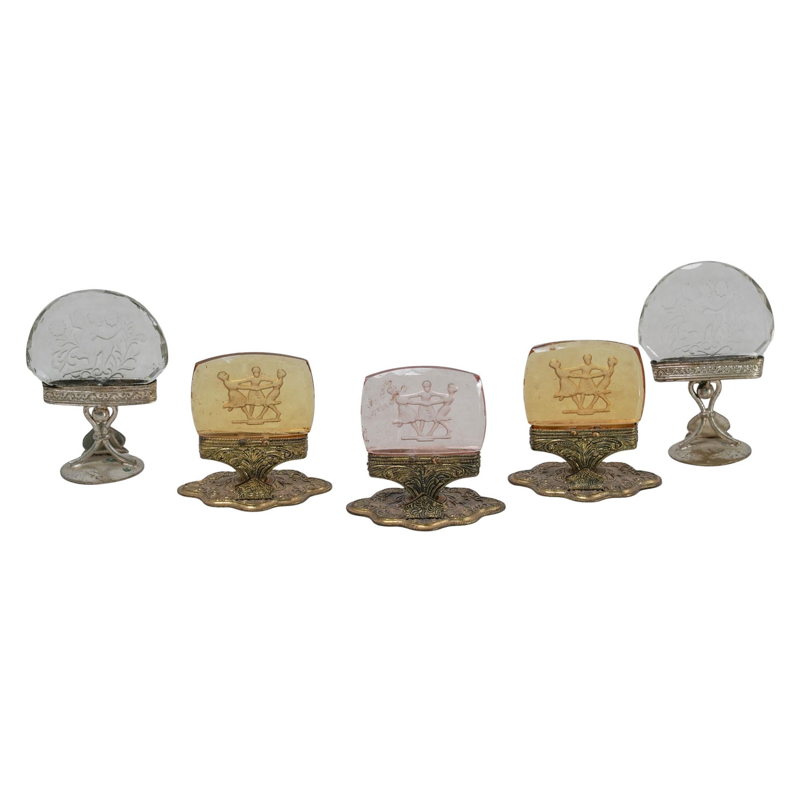 (5 pcs) Art Deco Czech Intaglio Cut Glass Place Card Holders: (5 pcs) Art Deco Czech Intaglio Cut Glass Place Card Holders1910s-1930s, CzechA set of five Art Deco Bohemian colored and clear glass place card holders with intaglio cut Neoclassical motifs. Three ha
