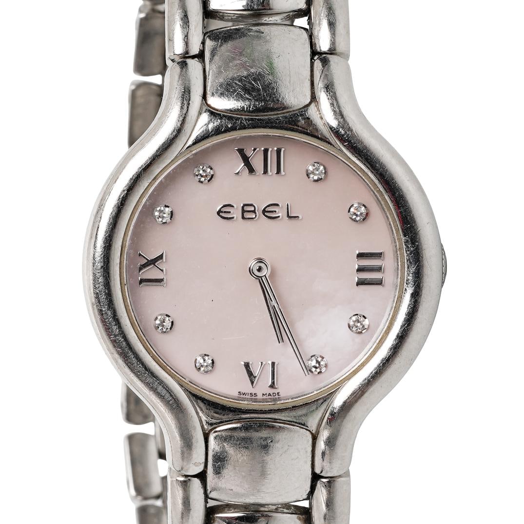 Ebel “Beluga?? Stainless Steel Diamond & MOP Dial Watch: Ebel “Beluga” Stainless Steel Diamond & MOP Dial WatchCirca 1990s, SwissStainless steel wristwatch from the Ebel Beluga collection, featuring a round case with integrated articulated bracelet.