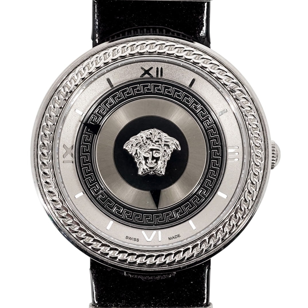 Versace V-Metal Icon Stainless Steel Watch: Versace V-Metal Icon Stainless Steel WatchLate 20th-early 21st century, Swiss madeA Versace V-metal icon watch. Features a stainless steel coin case, grumette pattern bezel, and Medusa head dial. Mark