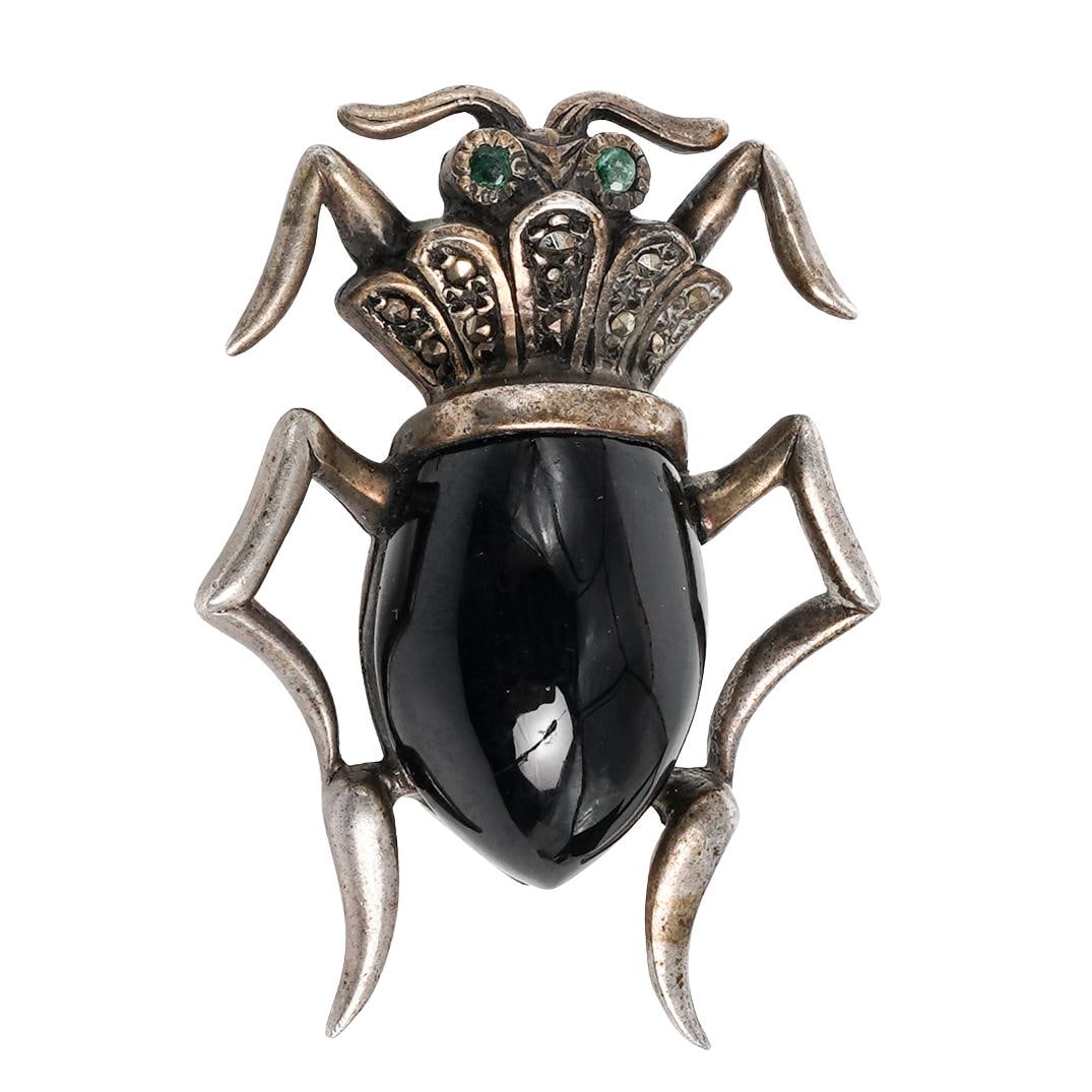 Vintage Sterling Silver & Onyx Marcasite Beetle Brooch: Vintage Sterling Silver & Onyx Marcasite Beetle Brooch Early to mid 20th century A vintage sterling silver and onyx beetle brooch with a marcasite inset stones. Marked "sterling" with hallmark on