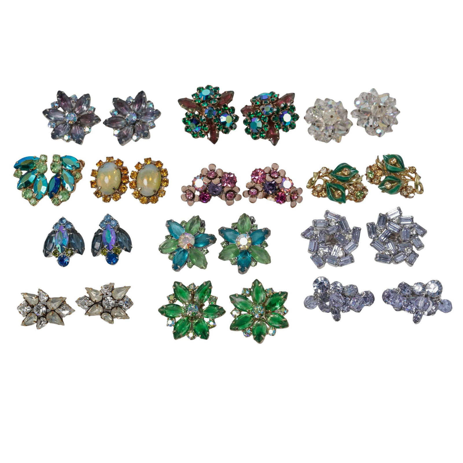 (13 pcs) Vintage Rhinestone Costume Jewelry Earrings: (13 pcs) Vintage Rhinestone Costume Jewelry EarringsMid to late 20th century, AmericanA set of twenty six (thirteen pairs) of vintage costume jewelry earrings. Each feature rhinestone clusters with si