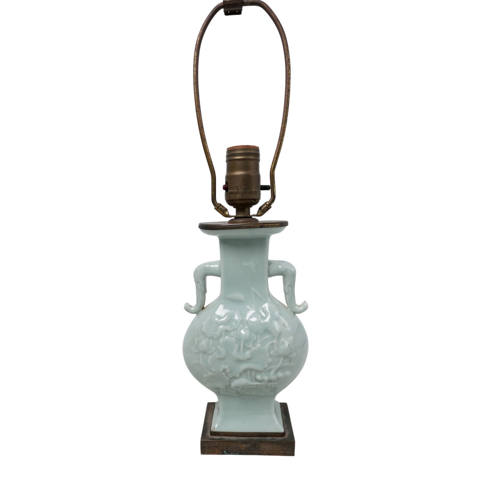 Antique Chinese Celedon Porcelain Vase Lamp: Antique Chinese Celedon Porcelain Vase LampLate 19th-early 20th century, ChineseAntique Chinese celadon porcelain vase converted into a table lamp with molded floral decoration and "elephant trunk" st